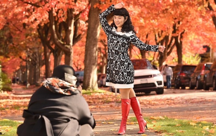  STRIKE A POSE: The vibrant fall colours along Cambridge Street in the East Vancouver neighbourhood of Hastings-Sunrise attract a steady crowd in search of the perfect photo. Photo Dan Toulgoet