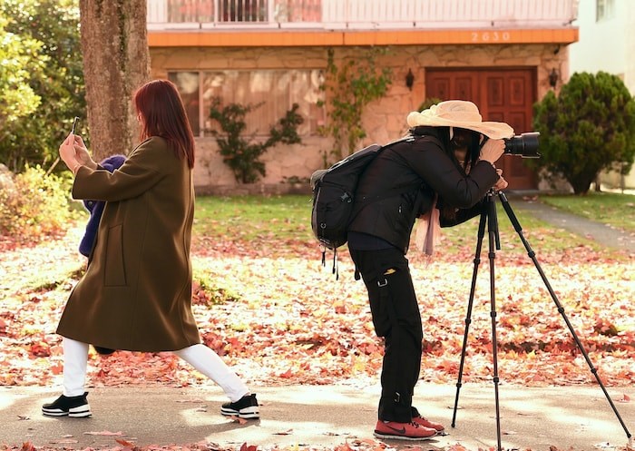  STRIKE A POSE: The vibrant fall colours along Cambridge Street in the East Vancouver neighbourhood of Hastings-Sunrise attract a steady crowd in search of the perfect photo. Photo Dan Toulgoet