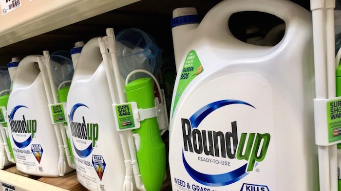 A lawsuit filed in British Columbia against Monsanto Canada ULC is just one of a growing number of lawsuits targeting the U.S.-based agrochemical corporation for its herbicide Roundup. Photo: Roundup/Shutterstock