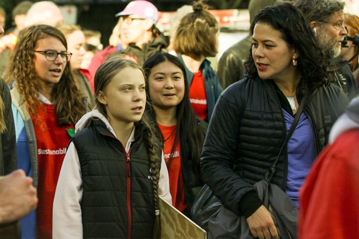  Greta Thunberg marches alongside Severn Cullis-Suzuki — daughter to Canadian environmentalist icon David Suzuki — Friday afternoon in Vancouver. Photo Kevin Hill