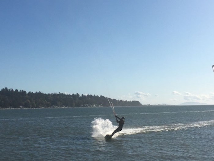  A kiteboarder catches some air off the causeway near the Tsawwassen Ferry Terminal on Fri. Oct. 25, 2019. Photo by Andrew Fleming/Delta Optimist