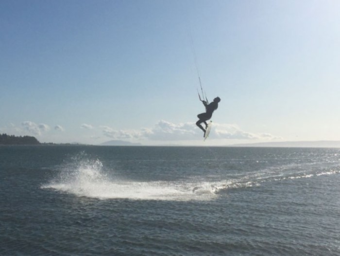  A kiteboarder catches some air off the causeway near the Tsawwassen Ferry Terminal on Fri. Oct. 25, 2019. Photo by Andrew Fleming/Delta Optimist