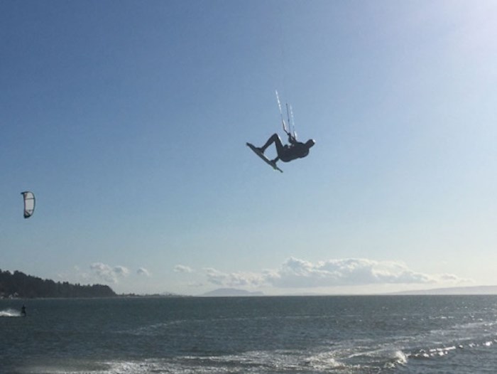  A kiteboarder catches some air off the causeway near the Tsawwassen Ferry Terminal on Fri. Oct. 25, 2019. Photo by Andrew Fleming/Delta Optimist