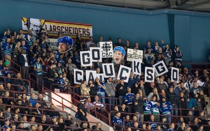  Occupying sections 325 and 326 at Rogers Areana, the Larscheiders fan club brings much-appreciated enthusiasm and sportsmanship to Canucks games. Photo Devin Manky