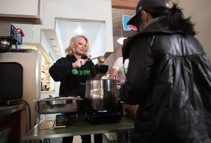  Actress and animal rights activist Pamela Anderson serves free vegan meals during an event held by Green Party candidate for East Vancouver Bridget Burns to register voters for the federal election, in the downtown Eastside of Vancouver, on Wednesday October 9, 2019. Actress Pamela Anderson is asking Prime Minister Justin Trudeau to take meat and milk off prison menus to help the planet and the health of federal inmates, and save taxpayers some cash, to boot. THE CANADIAN PRESS/Darryl Dyck
