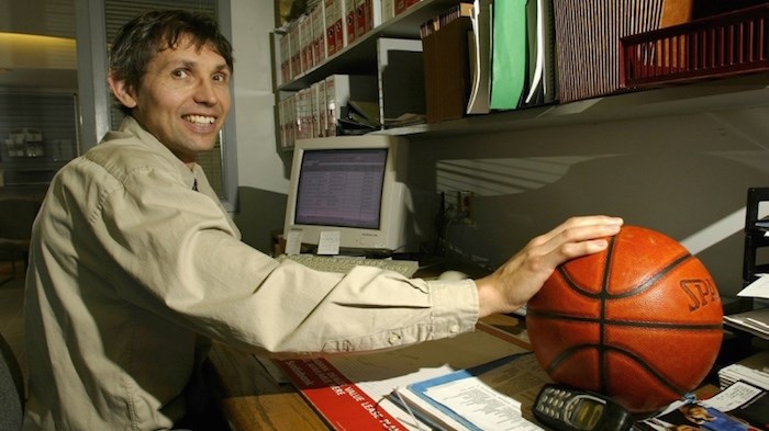  Eli Pasquale in 2004 at his car dealership office. Photo by Ray Smith/Times Colonist