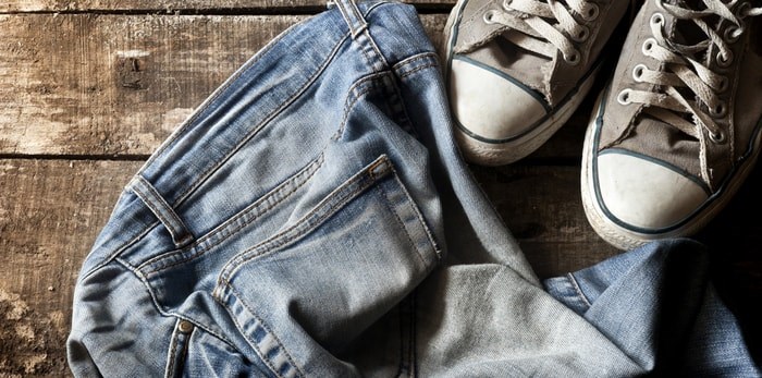  Return-It recycling is expanding its capacity to recycle old or unwanted clothing, household textiles and shoes at 32 locations across B.C. Photo: Old jeans and shoes/Shutterstock