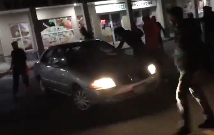  Screenshot of a video show mob violence in Surrey was posted to Wake Up Surrey Facebook page.