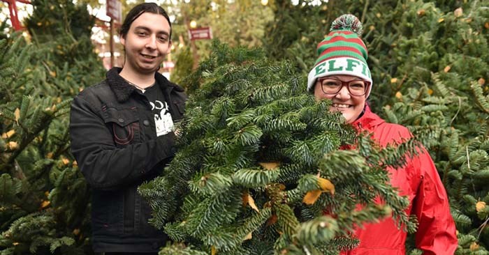  Roy and Angelina Oates at the Aunt Leah’s Christmas Tree Lot at St. Stephen’s Church on Granville Street. Photo Dan Toulgoet