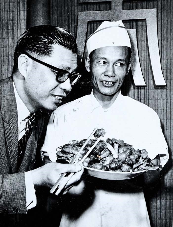  Owner Victor Louie samples his chef’s offering from Marco Polo’s 14-page menu. Photo courtesy of Tom Carter Archives