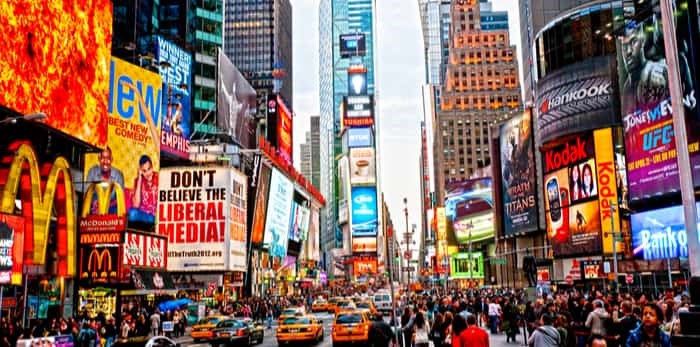  Photo: NEW YORK CITY -MARCH 25: Times Square, featured with Broadway Theaters and animated LED signs, is a symbol of New York City and the United States, March 25, 2012 in Manhattan, New York City. USA. / Shutterstock