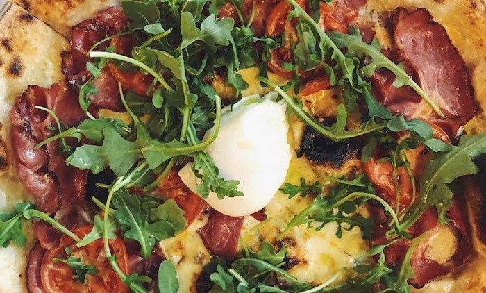  Pizza with a poached egg on top is on the brunch menu at Sprezzatura in Mount Pleasant. 
