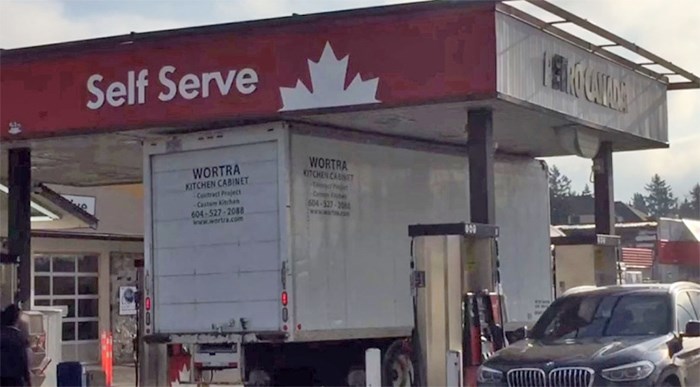  A delivery truck in a tight spot at the Petro-Canada gas station at 56th St. and 12th Ave. in Tsawwassen Friday.