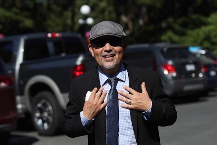  B.C. Green MLA Adam Olsen leaves Government House after Premier John Horgan was sworn in as premier in Victoria, B.C., on Tuesday, July 18, 2017. British Columbia's Green caucus says legislation promising a new relationship between the province and First Nations has passed unanimously in a 