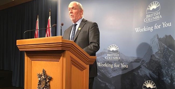  B.C. Premier John Horgan addresses a news conference at the B.C. legislature in Victoria, Thursday, Nov.28, 2019, where he discussed the most recent session of the legislature. Horgan says ride hailing is on it’s way to B.C., but he wouldn’t guarantee a Christmas arrival. THE CANADIAN PRESS/Dirk Meissner
