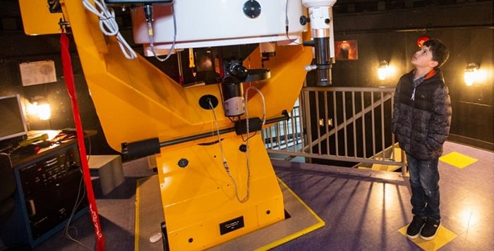  Jose Valdes Rodriguez, who says he wants to be an astronomer and help guide space missions, casts his eyes on the observatory telescope at the University of Victoria's Bob Wright Centre. Photo: Darren Stone, Times Colonist