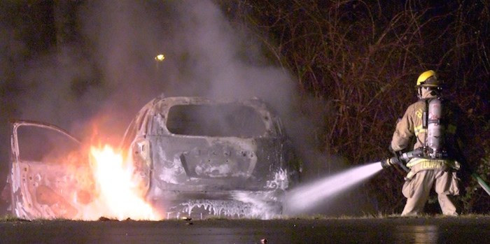  A vehicle was found in flames this morning at Fraser Park Drive and Byrne Creek Road in South Burnaby. Photo courtesy Jordan Jiang/CTV