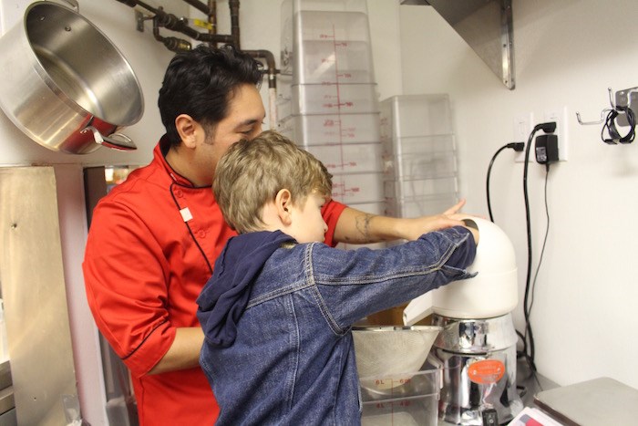  Juicing lemons for a passion fruit sorbetto. Photo by Lindsay William-Ross/Vancouver Is Awesome