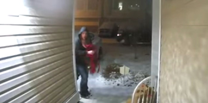  A woman was caught on camera stealing Christmas decorations from a home in West Kelowna late Sunday night. Screenshot/YouTube