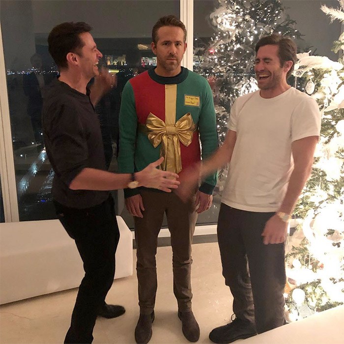  Hugh Jackman and Jake Gyllenhaal appear to be very happy that Ryan is wearing this fantastic sweater. Photo @vancityreynolds Instagram