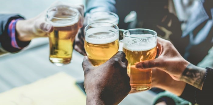  Cheers to the best in B.C. beer for 2019, according to readers of The Growler. Photo: Drinking beers with friends/Shutterstock