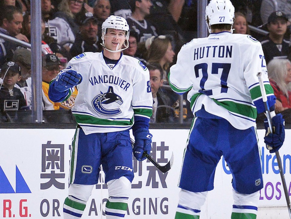 Nikolay Goldobin celebrates a goal with Ben Hutton