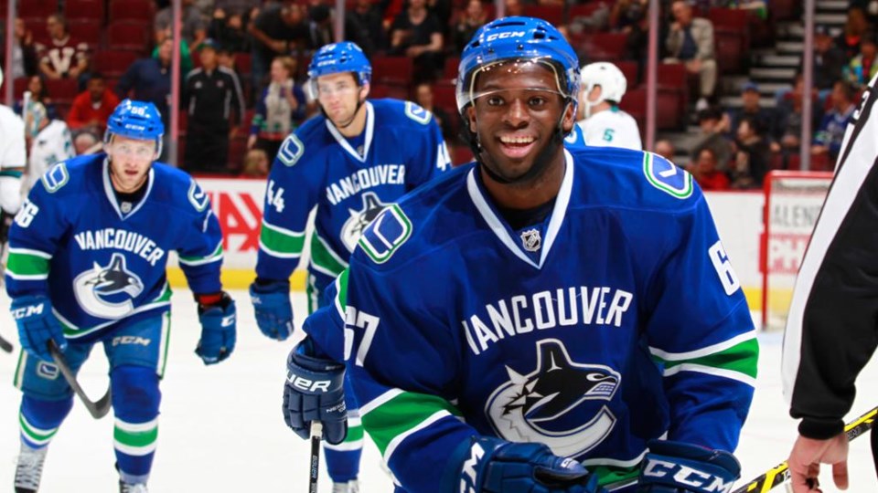 Jordan Subban smiles in a Canucks jersey