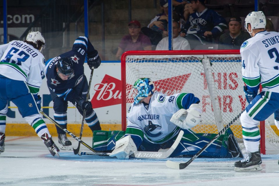 Thatcher Demko stretches to make the save at 2017 Young Stars