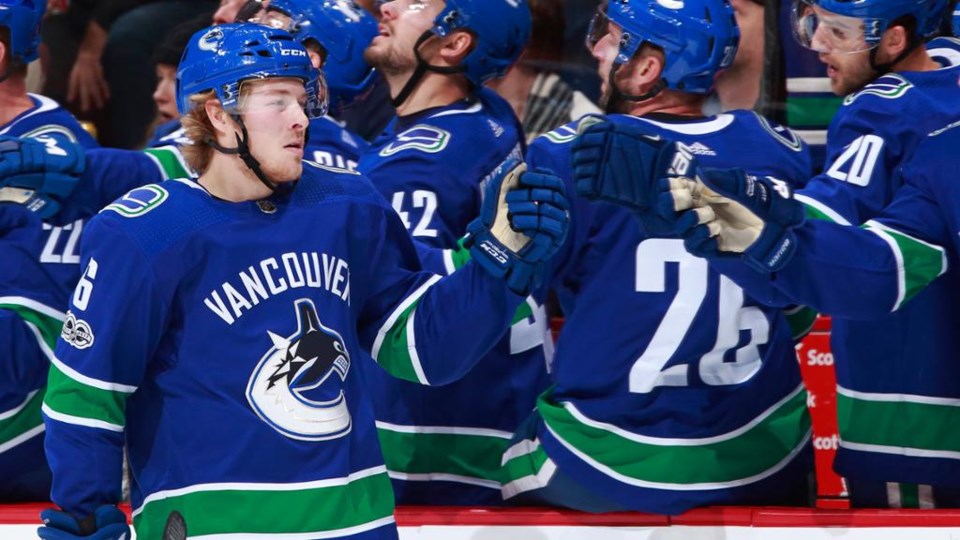 Brock Boeser celebrating yet another goal at the Canucks bench.