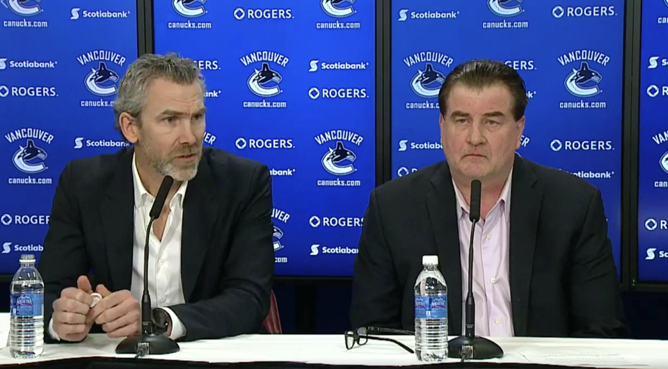Trevor Linden and Jim Benning at the press conference announcing Benning's contract extension.