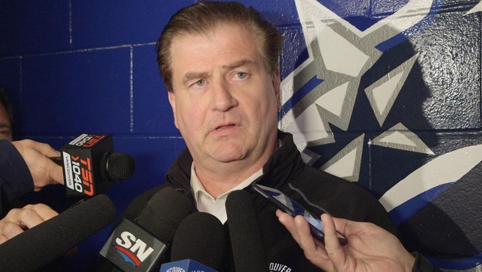 Jim Benning speaks to the media