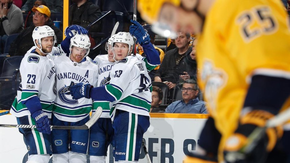 Canucks and Predators, goal celebration