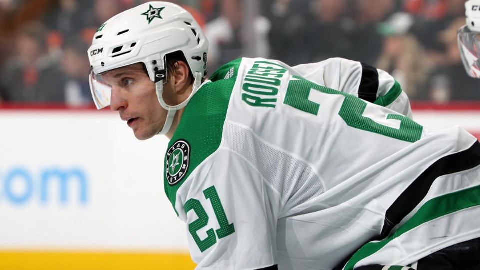Antoine Roussel lines up for a faceoff with the Dallas Stars