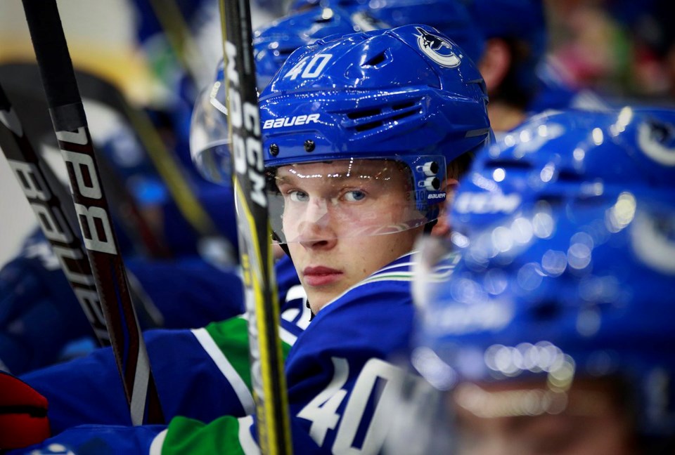 Elias Pettersson on the bench for the Canucks