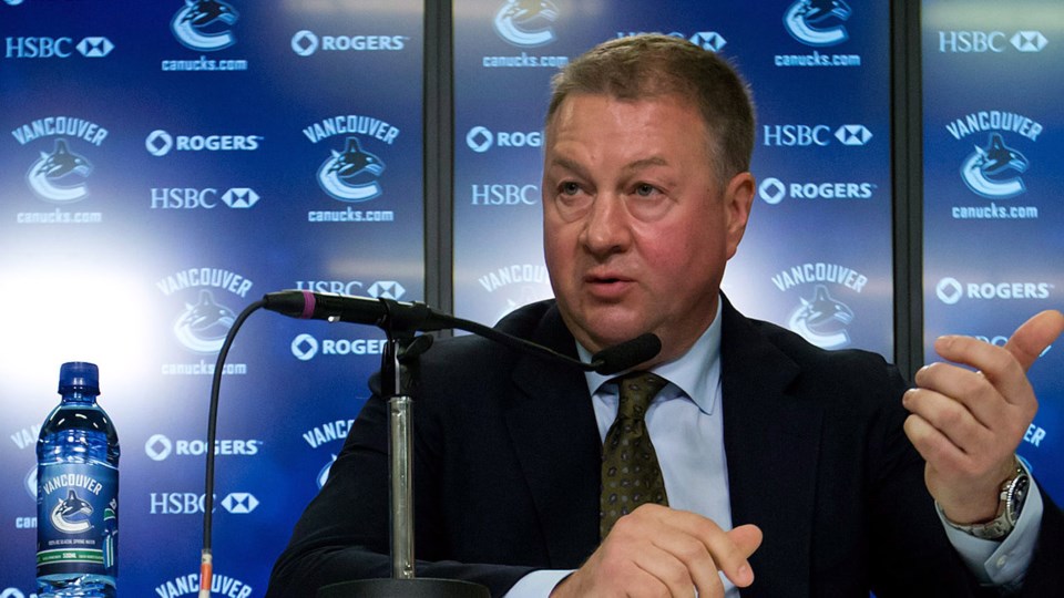 Mike Gillis answers questions from the media as GM of the Vancouver Canucks.