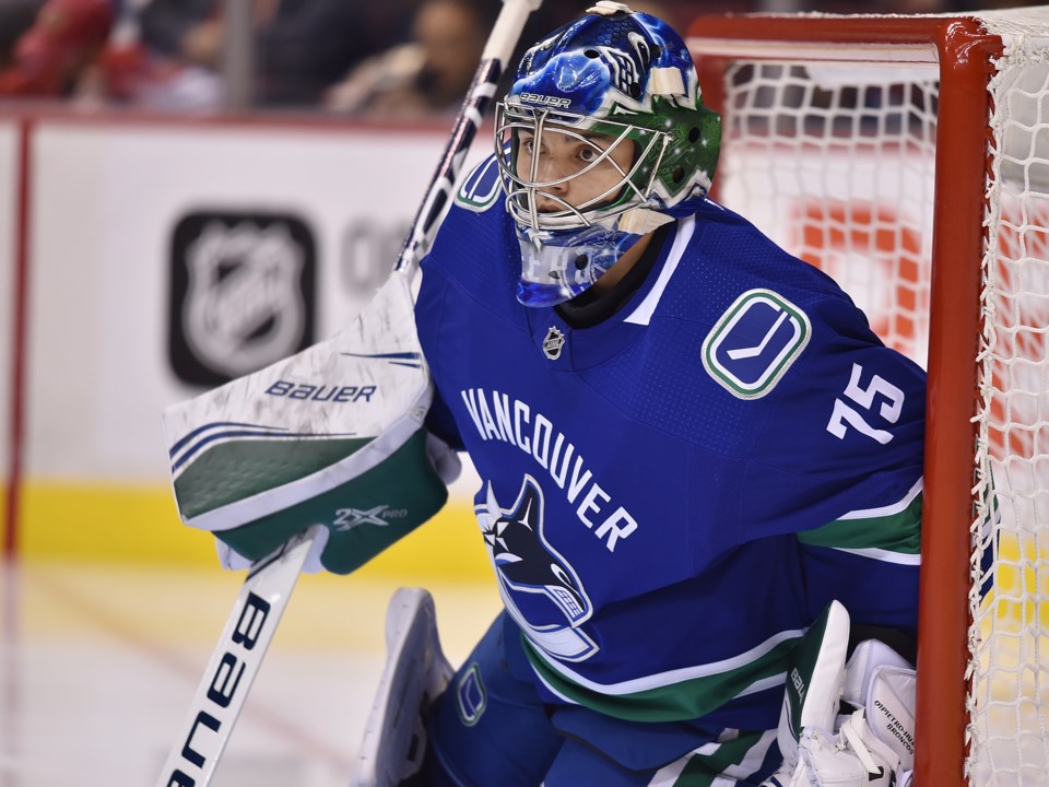 Mike DiPietro in net for the Canucks during the 2018 preseason