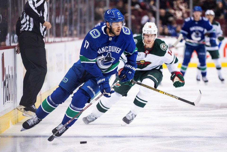 Josh Leivo skates up ice for the Vancouver Canucks against the Minnesota Wild