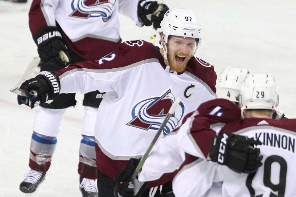 Gabriel Landeskog celebrates with his Colorado Avalanche teammates.