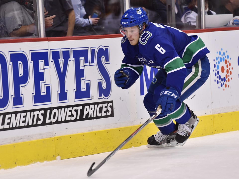 Brock Boeser chases down the puck with the Vancouver Canucks.