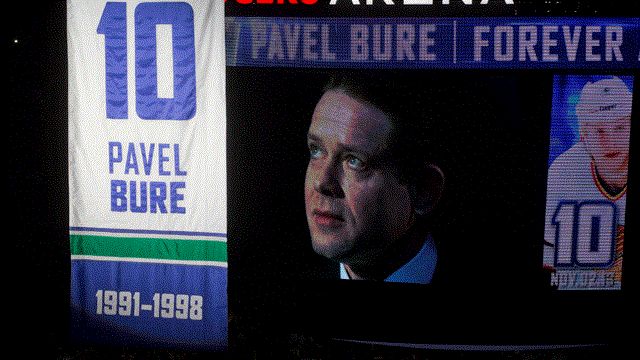 Pavel Bure looks on as his number is retired for the Vancouver Canucks.