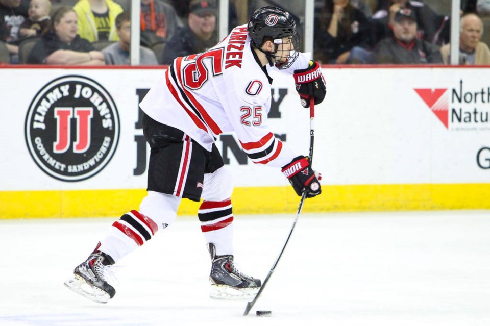 Justin Parizek skating for the Omaha Mavericks