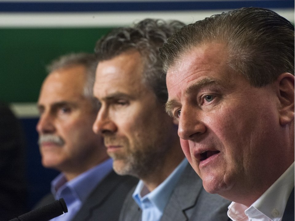 Jim Benning with Trevor Linden and Willie Desjardins