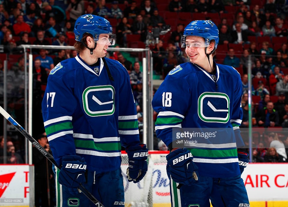 Ben Hutton and Jake Virtanen are happy youths.