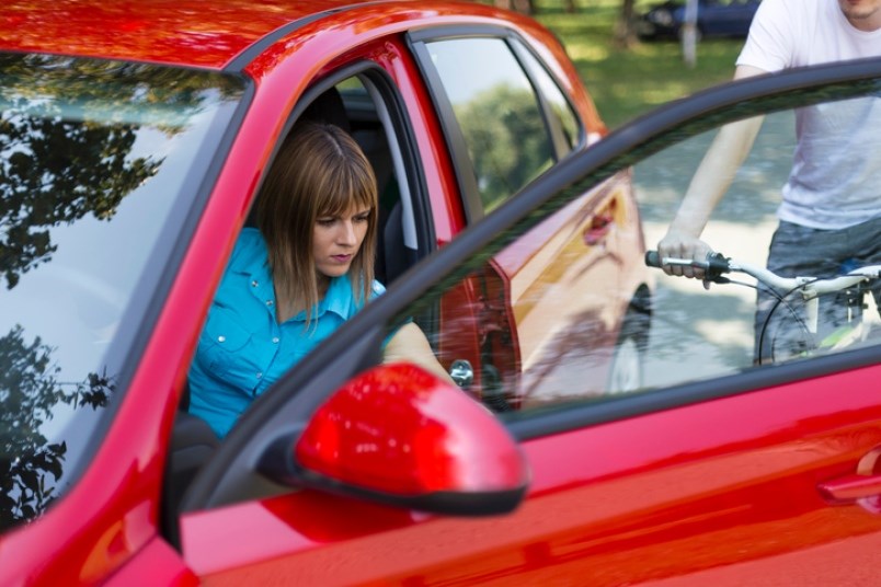 dooring-is-often-associated-with-opening-up-a-car-door-as-a-cyclist-is-passing-by