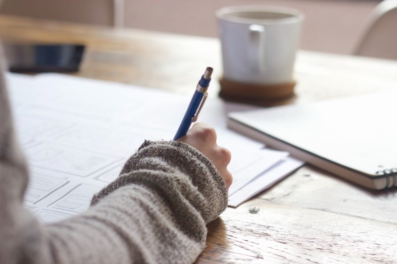 student-with-pen