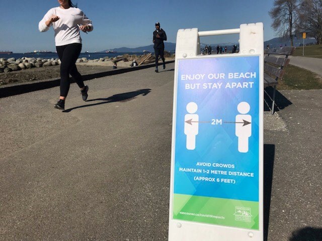 Vancouver park board runner social distancing sign