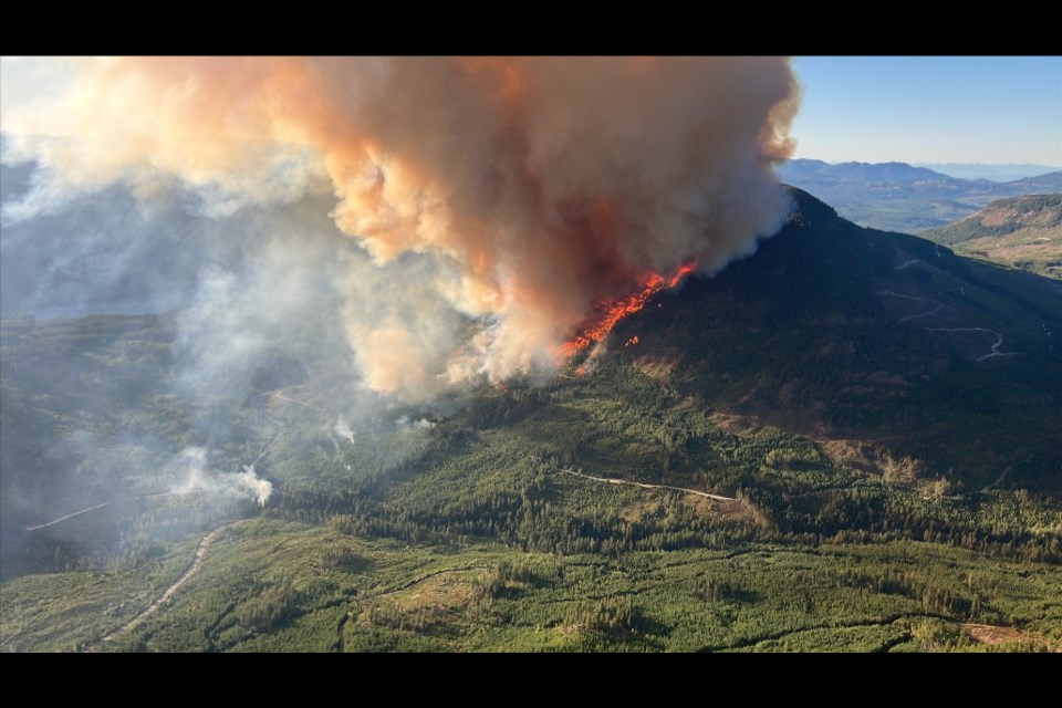 The Mount Underwood wildfire is seen in this handout photo, southwest of Port Alberni on Monday, Aug. 11, 2025. B.C. WILDFIRE SERVICE