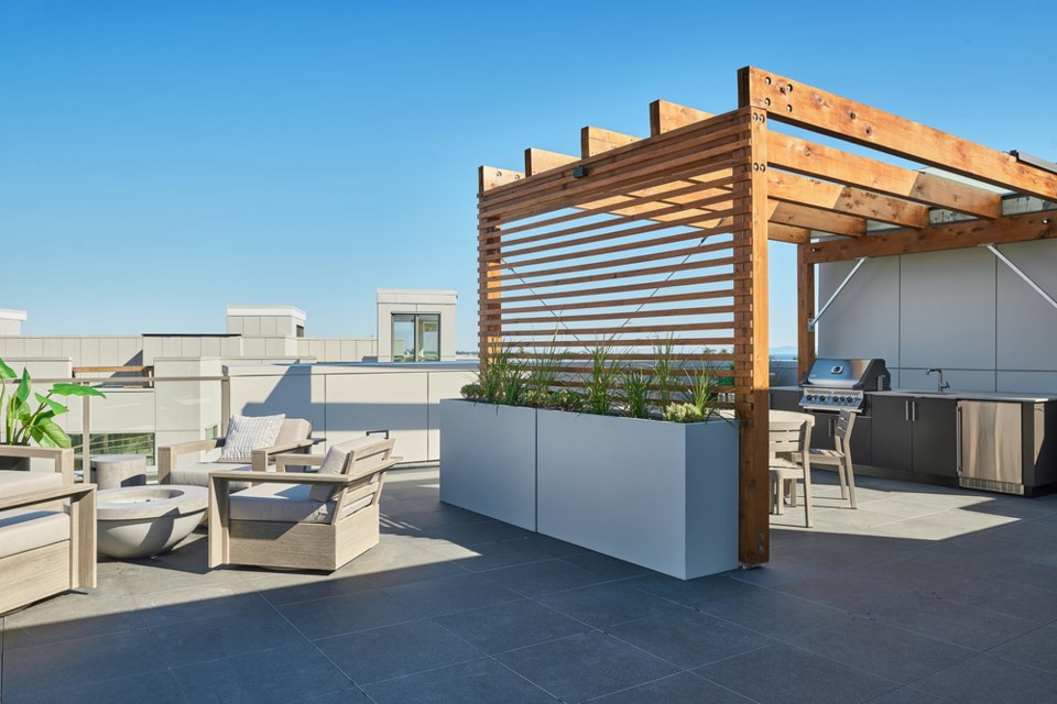 The penthouse features a private rooftop terrace boasting stunning 180-degree views of the Salish Sea, perfect for entertaining.