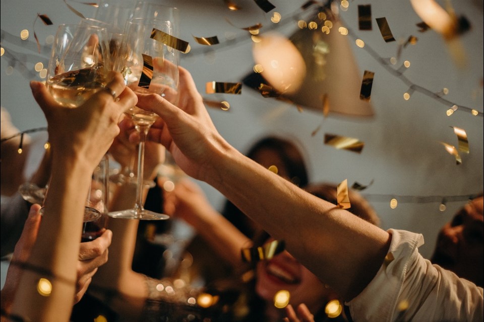 People toasting during New Year's Eve celebrations.