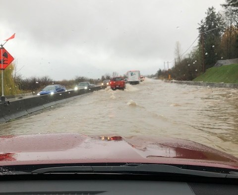 The flooded Trans-Canada Highway, near Drinkwater Road, by the Walmart north of Duncan on Monday, Nov. 15, 2021. DINAH ROBINSON
